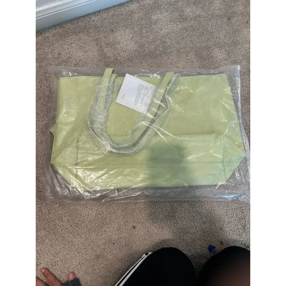Green purse with wallet